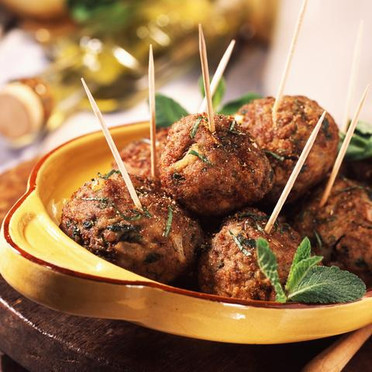 Deer and lamb meatballs with mint, raisins and pine nuts and dip 